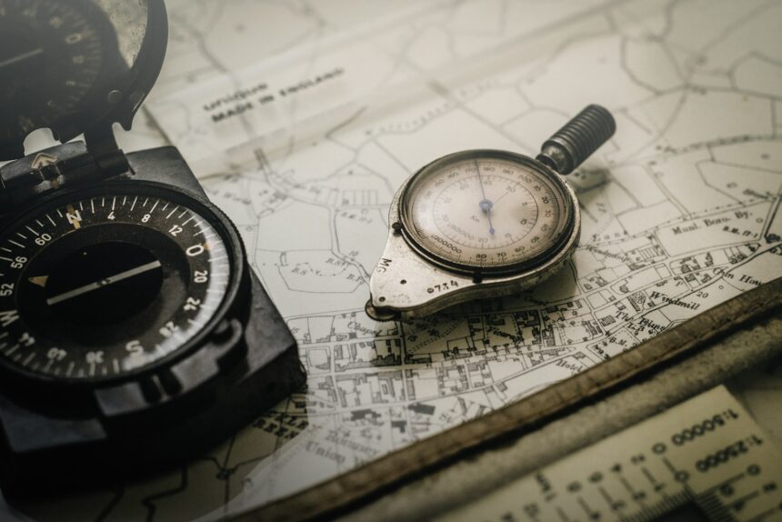 black and gray compass on top of map; contract-free fleet tracking