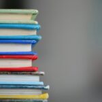 shallow focus photography of books; Vinod Gupta education India