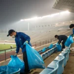 japan fans clean stadium after match