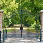 black metal gate near green trees during daytime; private market allocation