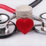 a stethoscope with a red heart on top of it; long-term care insurance