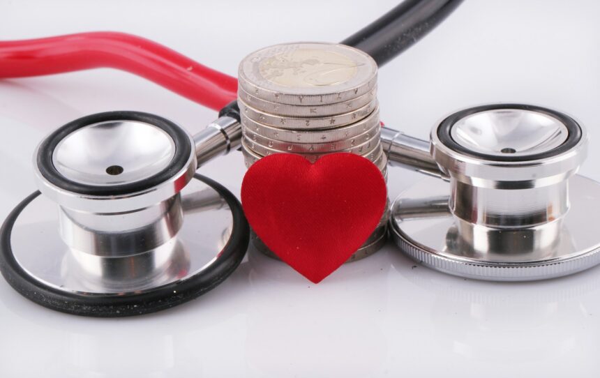 a stethoscope with a red heart on top of it; long-term care insurance