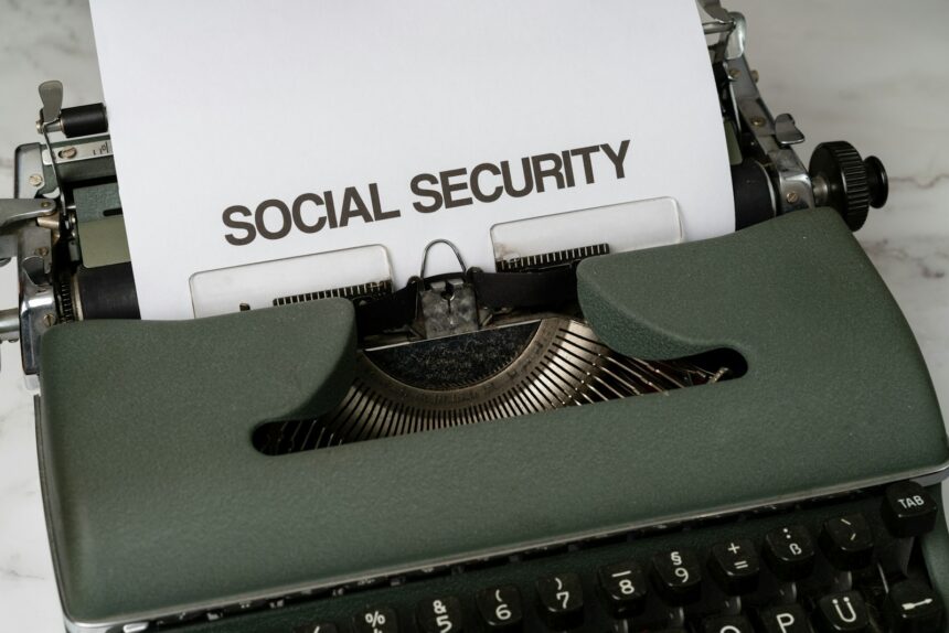 A typewriter with a Social Security death benefit form, representing the $255 lump-sum death payment